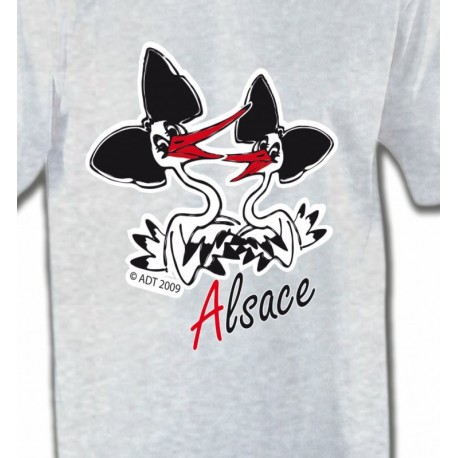 Deux cigognes avec coiffes alsaciennes